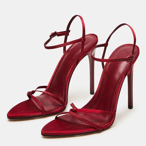 Elegant Maroon Satin Sandals featuring a chic pointy toe and cross straps, elevated with stiletto heels. A sophisticated choice that combines style and grace for a refined look. Color: Maroon Material: Satin Heel Type: Stiletto heel Heel Height: 4.49" / 114 mm approx Product measurements were taken using size 8. Please note that measurements may vary by size. Toe: Open pointed toe Cross strap design Adjustable buckled ankle strap design Handcrafted US sizing. Fits true to size.