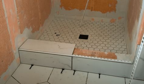 Tiled Shower Threshold, Tile Shower Curb Ideas, Shower Threshold Tile Ideas, Shower With Curb, Shower Threshold Ideas, Shower Curb Tile Ideas, Tile Shower Curb, Unfinished Bathroom, Schluter Shower