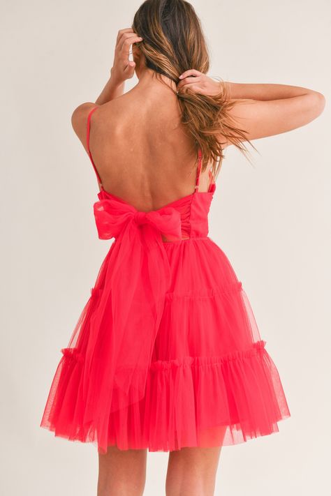 This Tulle Mesh Bow Back Mini Dress features adjustable spaghetti straps, a ruffle tiered design, and a front bust ruched detail. The back showcases a large self tie bow and exposed zipper, while the dress is fully lined for added comfort. Perfect for weddings, engagements, and special occasions. Hoco Dresses Red, Semi Dresses, Tulle Mini Dress, Mesh Bows, Valentines Day Dresses, Cute Prom Dresses, Soft Tulle, Bow Back, Tie Bow