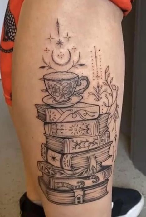 Cat On Stack Of Books Tattoo, Teacup And Book Tattoo, Black And White Book Tattoo, Dragon And Books Tattoo, Book Shelf Tattoo, Book And Coffee Tattoo, Book Worm Tattoo, Fantasy Book Tattoo Ideas, Book Sleeve Tattoo