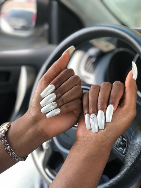 White chrome nails with rhinestones White Chrome Nails With Rhinestones, Nail Inspo Rhinestones, Chrome Nails With Rhinestones, Red Wedding Nails, Bubblegum Pink Nails, Long White Nails, Sparkly Acrylic Nails, Clear Glitter Nails, White Chrome Nails