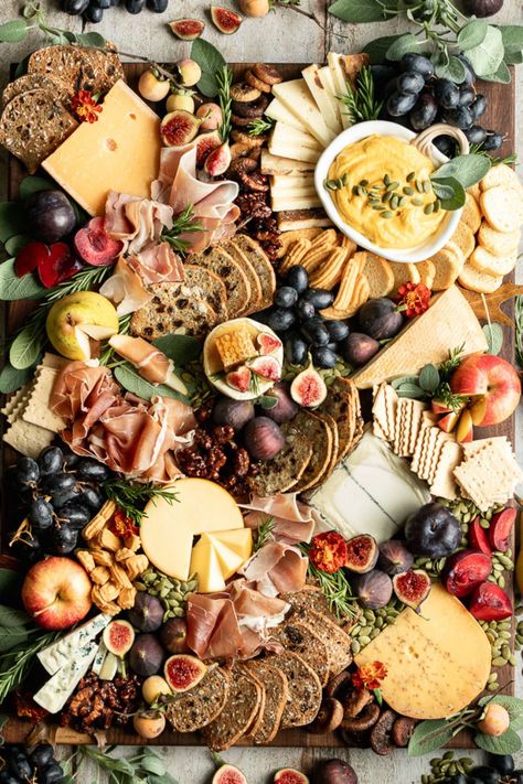 Celebrate and welcome fall with an abundant fall cheese board. It is such a special time of year and a cheese and charcuterie board studded with in-season herbs, figs, apples, and pears is the perfect way to celebrate and welcome the fall season after a long, hot summer. #fallcheeseboard #fallcharcuterieboard Charcuterie Board With Pears, Fancy Dessert Charcuterie Board, Autumn Charcuterie Board Aesthetic, Persian Charcuterie Board, Bougie Charcuterie Board, Masquerade Charcuterie Board, Charcuterie Fall Board, Meats And Cheese Board, Fall Graze Board