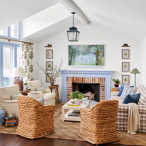 Sky-Blue Paint Coats This Renovated Cottage in Cheery Color Sky Blue Paint, Renovated Cottage, Farmhouse Fireplace Decor, Cinder Block Walls, Living Room Mantel, White Fireplace, Blue Furniture, Cool Floor Lamps, Yard Design