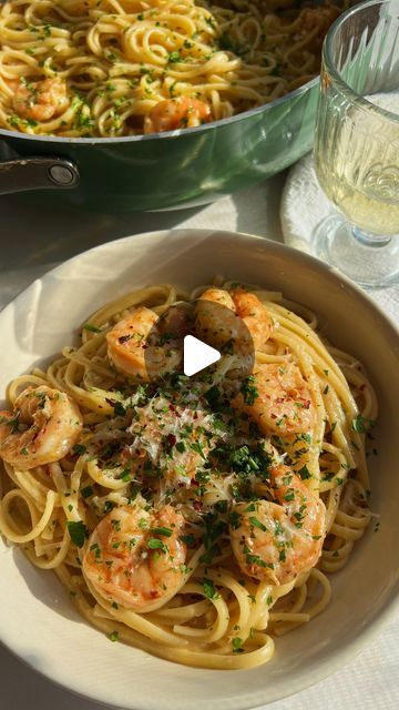 Brooke Carson on Instagram: "SHRIMP SCAMPI 🍤 This Shrimp Scampi recipe is our go-to meal for at-home date nights and I wanted to share it as it would be perfect for Valentine’s Day if you are spending it in tomorrow night 🥰 It comes together in one pan in under 30 minutes - pair it with your favorite glass of white wine for the perfect date night dinner! 🥂 INGREDIENTS: - 1lb shrimp, devained & detailed - 1 tsp garlic powder - 1 tsp onion powder - 1 tsp paprika - Salt & pepper - 2 tbsp olive oil - 12oz linguine - 1/2 cup (1 stick) of butter - 4-6 cloves garlic, diced - 1/4-1/2 tsp red pepper flakes - 1/2 lemon, juiced - 1/2 lemon zested - 1/4 cup white wine - 1 cup parmesan cheese - 1/2-1 cup pasta water - 1/4 cup parsley DIRECTIONS: 1. Prepare pasta according to packaging, reserving 1 c Glass Of White Wine, Date Night Dinner, Shrimp Scampi Recipe, Date Night Dinners, Pasta Water, Scampi Recipe, The Perfect Date, Perfect Date Night, Shrimp Scampi