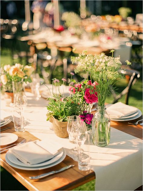 generally like this table style, but in color scheme to match rest of wedding (white + soft colors) Bottle Vase Centerpiece, Rustic Dinner Tables, Rustic Country Wedding Decorations, Herb Wedding, Tattoo Plant, Spring Flower Arrangements, Country Wedding Decorations, Vase Crafts, Rustic Wedding Flowers