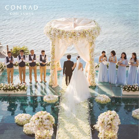 Exchange #wedding vows on the idyllic tropical #beach, high above the lush forests and white beaches of #KohSamui or over-the-water at our infinity-edge #pool with breathtaking view of the Gulf of #Thailand! For more information about the #weddingpackage, visit conradkohsamui.com #StayInspired #ConradHotels #Kohsamui #ConradKohSamui #Samui Water Theme Wedding, Infinity Pool Wedding, Indian Beach Wedding, Wedding Stairs, Outdoor Beach Wedding, Wedding Aisles, Wedding Day Wishes, Edge Pool, Cocktail Wedding Reception