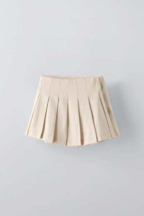 FLOWY PLEATED SKIRT - Sand | ZARA United States Asymmetrical Skirt With Pleated Hem For Spring, Spring Asymmetrical Skirt With Accordion Pleats, Cotton Mini Skirt With Pleated Hem, Cotton Pleated Skort For School Uniform, Spring Asymmetrical Pleated Skirt With Accordion Pleats, Fitted Pleated Asymmetrical Mini Skirt, Pleated Asymmetrical Fitted Mini Skirt, Cotton Pleated Tennis Skirt, Fitted Asymmetrical Pleated Mini Skirt