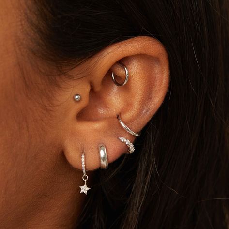 Description Our essential for everyday - say hello to the Basic Ear Cuff in Silver. No piercing needed, the cuff will sit comfortably in your ear for that “oh I just got it pierced” faux conch piercing look (we won’t tell). You can also stack it up with different plating’s and styles for a curated vibe. Details    Composition Rhodium Plated Sterling Silver Hoop Size 1.2cm (adjustable)   Care As most of our pieces are costume jewellery made from sterling silver or brass, plated wit Conch Hoop, Curated Ear, Ear Stack, Silver Ear Cuff, Conch Piercing, And Just Like That, For Sale Sign, Sterling Silver Hoops, Simple Earrings