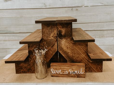 Diy Rustic Cupcake Stand Display, Tiered Cupcake Stand Diy Rustic Wood, Wood Tiered Cupcake Stand, Cupcake Display At Wedding, Cupcake Board Display, Boho Wedding Cake And Cupcake Display, Cupcake Wedding Display Rustic, Rustic Wedding Sweets Table, Cupcake Holders For Weddings