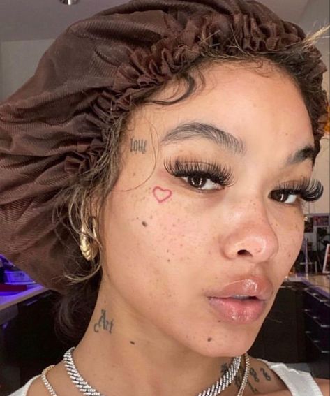 India Love Face Tattoos, Lil Face Tattoos, Love Heart Face Tattoo, Fake Face Tattoo, Cute Face Tats, Heart Face Tattoo, Pretty Face Tattoos, Under Eye Tattoo, Small Face Tattoos