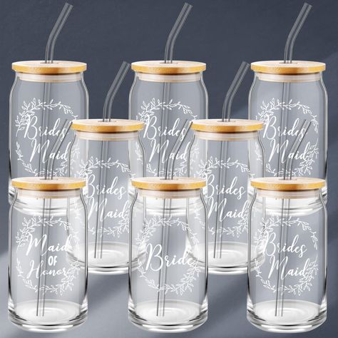 PRICES MAY VARY. Wedding Party Set: our package includes 8 pieces of iced coffee cups with lids and straws, including 1 bride cup, 6 bridesmaid cups, and 1 maid of honor cup, nice combination to satisfy your wedding needs Reliable Materials: made from quality glass, our cups and straws are not only durable but also provide an elegant touch to your event; The bamboo lids add a rustic charm, making the bridesmaid proposal gifts ideal for a wedding or bridal shower Right Size: our bride cups for ba Bridesmaid Cups Diy, Wedding Gift For Bridesmaids, Bridal Gifts For Bridesmaids, Wedding Cups For Guests, Bridal Party Gift Ideas, Wedding Favor Ideas For Guests, Bride Cups, Acotar Wedding, Wedding Party Gift Ideas