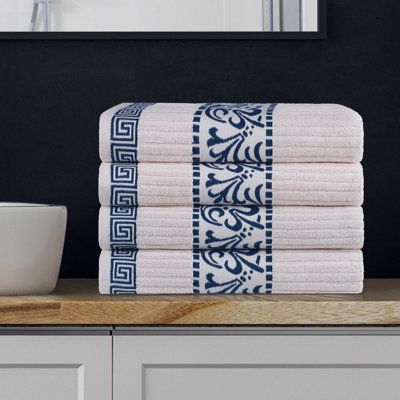 Style your bathroom with the beautiful 4-Piece Cotton Decorative Bath Towel Set. Made from a premium cotton construction and boasting a cozy, 550 GSM (grams per square metre) towel weight, this set is thick, absorbent, and incredibly soft to the touch. Each bundle includes four bath towels, available in white with an array of vibrant colour borders featuring a gorgeous Greek key and a delicate scroll pattern. Pamper yourself or reserve this set for guests to bring a modern flourish to any master or guest bath. | Red Barrel Studio Mikira Athens Cotton Medium Weight Floral Border Greek Key Trim Bath Towel (Set of 4) by Superior 30.0 in | C004515327_706404709 | Wayfair Canada Decorative Bath Towels, Red Bar, Fluffy Towels, Greek Design, Quick Dry Towel, Scroll Pattern, Decorative Borders, Bathroom Towel, Cotton Bath Towels