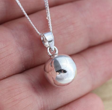 This is 925 sterling silver  ball pendant. 925 stamped. Highly polished. Approx. measures:               Total length: 18mm             Round ball diameter: 10mm.     Comes in gift box! This is ball pendant only without chain.                     Thank you for looking! Sterling Silver Name Necklace, Handmade Silver Jewellery, Silver Ring Designs, Sterling Silver Cufflinks, Fine Silver Jewelry, Silver Jewellery Sets, Ball Pendant, Silver Cufflinks, Pretty Rings