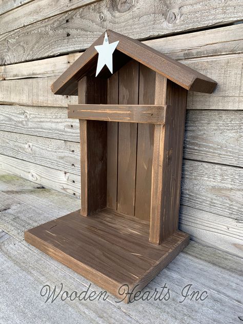 "This WOOD STABLE is a beautiful Stable for a Nativity Set. It works PERFECTLY to display on a fireplace mantle! (The Willow Tree nativity pieces are NOT INCLUDED but are pictured to display the size of the stable.) The baby manger, angel stand, custom sign, & lights are available for an additional cost. We make these stables ourselves, so we can offer it to you at this great price! Each stable will vary & have it's own unique \"handmade touch\"! The stable is made in our shop in MN. It is made Fireplace Mantle Wood, Mantle Wood, Stand Lights, Nativity Scene Display, Willow Tree Nativity, Nativity Creche, Nativity Stable, Willow Tree Angels, Diy Nativity