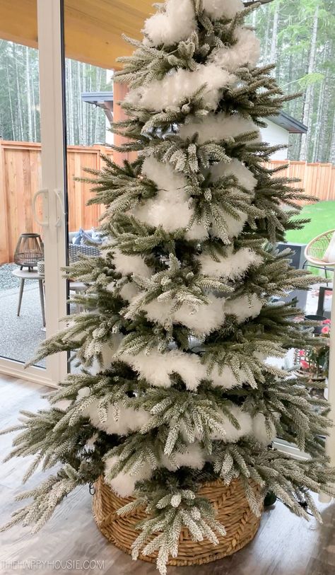 The Christmas tree with extra flocking on it. Woods Christmas Tree, Cotton Snow On Christmas Tree, Rustic Scandi Christmas Tree, Christmas Tree Topper Woodland, Rustic Natural Christmas Tree, Simple Natural Christmas Tree, Christmas Trees With Snow, White Natural Christmas Decor, Forest Christmas Decor Winter Wonderland