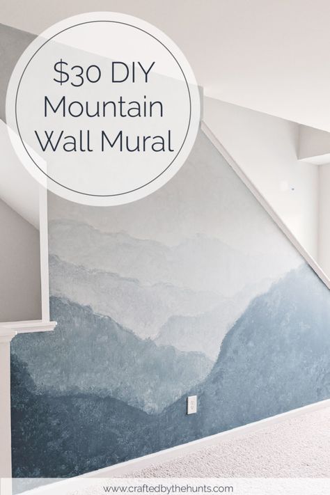 Create a beautiful watercolor mountain wall mural in just a few hours. Follow this step-by-step tutorial for a beautiful feature wall mural. Painting Ideas For Stairway Walls, Diy Painted Mural Ideas, Diy Boho Wall Mural, Diy Mountain Wall Art, Unique Wall Painting Ideas, Nursery Mountain Mural, Creative Wall Painting Ideas, Wall Murals Painted Diy, Ombre Mountains