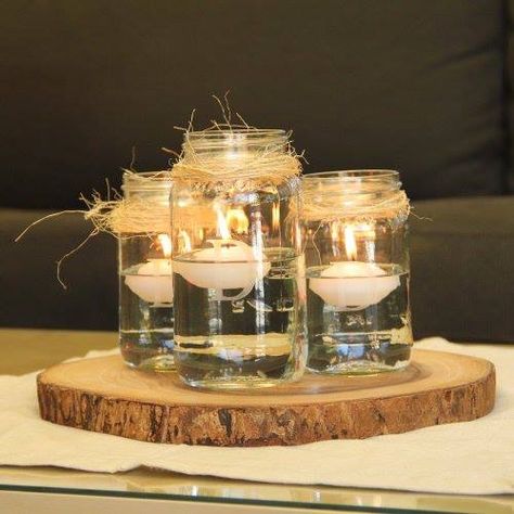 Really like this for a winter wedding centerpiece - makes me think I'm sitting by the fireplace..:) Floating Candles Mason Jars, Winter Wedding Centerpieces, Tafel Decor, Rustic Mason Jars, Dekor Diy, Country Chic Wedding, Rustic Centerpieces, Rustic Wedding Centerpieces, Mason Jar Centerpieces