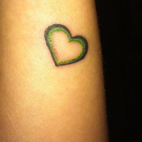 Be still my GREEN HEART tattoo Green Heart Tattoo, Green Tattoo, Face Tattoos For Women, Green Tattoos, Aesthetic Tattoos, Green Hearts, Heart Tattoo Designs, Face Tattoos, Tattoo Cover-up