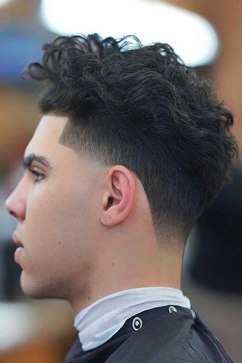 Best Haircuts For Men To Rock In 2020 | MensHaircuts.com Taper Fade Long Hair, High Taper Fade, Low Taper Fade Haircut, Mid Fade Haircut, Taper Fade Curly Hair, Fade Haircut Styles, Low Taper Fade, Drop Fade Haircut, High Fade Haircut