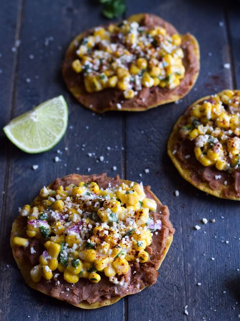 Ready in only 15 minutes, these Mexican Street Corn Tostadas made with canned corn, cotija cheese and chopped cilantro make for an easy lunch or quick dinner that's also gluten free and vegetarian. Street Corn Tostadas, Corn Cotija, Corn Tostadas, Isabel Eats, Vegan Burrito, Yellow Rice, Cotija Cheese, Mexican Street Corn, Street Corn