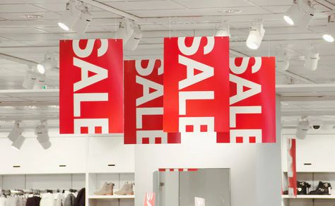 The Best Time to Buy a New Mattress in 2021 | Saatva Sale Rack Sign, Sale Signage, Shoes Display, Sale Signs, Best Time To Buy, Retail Design Display, Store Signage, Sale Windows, Hanging Banner