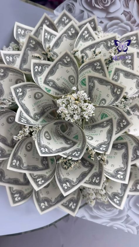 💐Money Flowers and beyond since 2019 | Here’s 10 bills Money Bouquet tutorial! #kkhouse #moneybouquet #moneybouquetbykkhouse #tutorial #diy #mothersday #birthday #howto | Instagram Money Bouquet Tutorial, Grad Leis, Lei Diy, Money Lei Diy, Gifts Bouquet, Graduation Leis Diy, Ribbon Flowers Bouquet, Boyfriend Gift Basket, Bouquet Tutorial