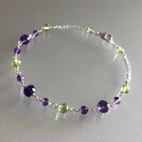 Purple And Green Jewelry, Purple And Green Bracelet, Purple Bracelets, Pearl Jewlery, Green Gemstone Bracelet, Amethyst And Peridot, Amethyst Bracelet Beads, Beautiful Beaded Bracelet, Green Beaded Bracelets