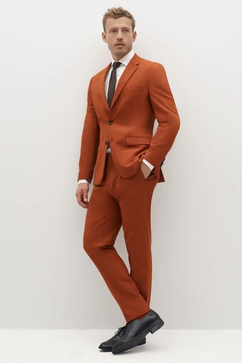 Burnt orange is the hue du jour, and while aisles might not be fashion runways, they’re certainly not exempt from taking inspiration from them. Whether you’re interested in rocking a burnt orange suit on your wedding day, asking your wedding party to dress in burnt orange or seeking other wedding ideas to incorporate the rusty shade, we’ve got you covered with these 10 ways to use burnt orange in your wedding. Terracotta Suit Men, Burnt Orange Suits For Men, Orange Suit Mens, Burnt Orange Tuxedo, Burnt Orange Suit, Dj Wedding, Orange Suit, Uncle Birthday, Orange Blazer