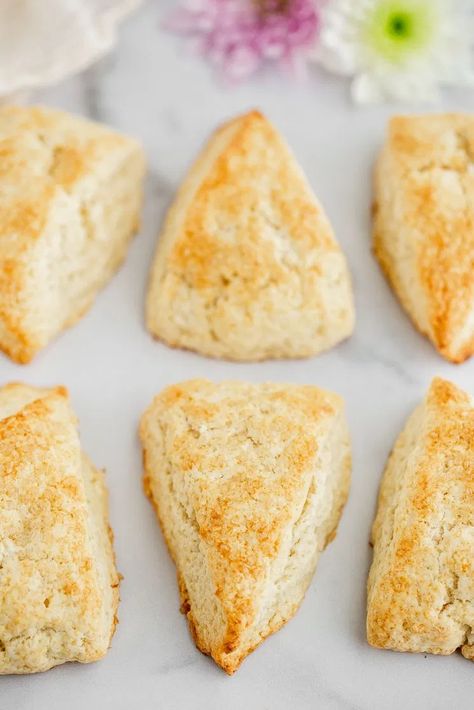 place the scones on a baking sheet lined with parchment paper or a silicone baking mat and place the baking sheet in the freezer for 5-10 minutes so that the dough is thoroughly chilled.  Once it’s nice and cold, brush the tops of the scones with a little heavy whipping cream. If you don’t plan to add a glaze on top, you can sprinkle them with a little coarse sugar Scone Recipe With Heavy Cream, Easy Breakfast Sides, Dessert Scones, Tender Scones, Cream Scones Recipe, Best Scones, Best Scone Recipe, Breakfast Sides, Scones Recipe Easy