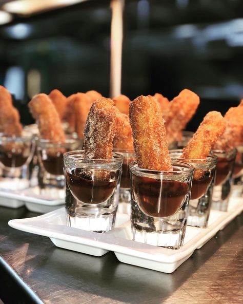 🚨NEW DESSERT ALERT🚨 Exclusive new item to our Gourmet Passed Desserts Upgrade, mini churros with a spiced chocolate dipping sauce! Our Gourmet Passed Desserts keeps the dancing going all party long as our staff white glove serves delicious mini sweet treats! YUM! Inquire today about this upgrade! 🤤🍦🍩🍪 Churro Dessert, Spanish Churros, Latin Desserts, Churros Con Chocolate, Mini Churros, Chocolate Dipping, Wedding Bakery, Park Chateau, Chocolate Dipping Sauce