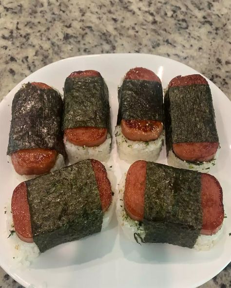 Get a taste of the islands with homemade Spam Musubi! Simple, savory, and so satisfying. 🌺🍙 Spam Musubi Hawaiian Spam Musubi Delight Ingredients: 2 cups uncooked short-grain white rice 2 cups water 1 (12-ounce) can Spam 1/4 cup soy sauce 1/4 cup oyster sauce 1/4 cup white sugar 5 sheets nori (dry seaweed) Furikake (optional) Directions: Rinse the rice under cold water until the water runs clear. Cook the rice with 2 cups of water in a rice cooker or on the stovetop according to package i... Spam Wasabi, Homemade Spam, Hawaiian Spam Musubi, Spam Rice, Musubi Recipe, Spam Musubi, So Satisfying, Oyster Sauce, White Rice