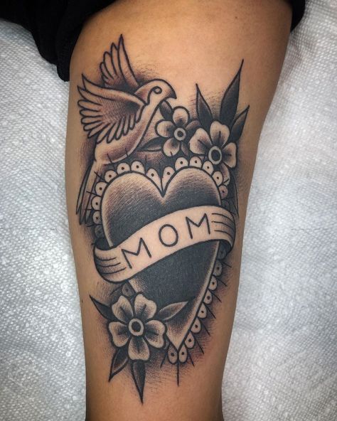 #Tattoos,Mum tattoo Check more at https://outsons.com/amazing-mom-tattoos-designs-you-will-love/ Mum Tattoo Ideas For Men, Mum Tribute Tattoo, Mum Tattoo For Men, Tattoos Mum, Tattoo Ideas For Moms, Mum Tattoo, Traditional Heart, Tattoos 2024, Tribute Tattoos