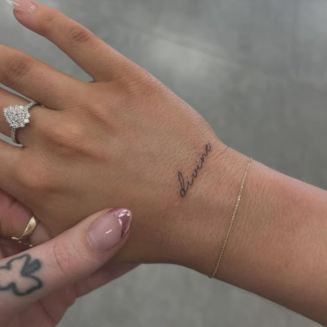 Tatoos Write, Petite Hand Tattoos, Small Hand Tattoos Writing, Top Of Wrist Tattoos Words, Patience Wrist Tattoo, Name Placements Tattoos, Small Spanish Quotes Tattoo, Cute Tiny Hand Tattoos, Hand Tattoo Placement Words