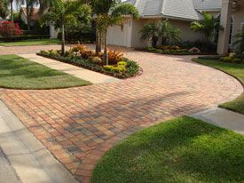 Driveway brick can be a great choice for your project while adding value to your home. See beautiful photos of brick driveway designs here. Circle Driveway Landscaping, Brick Paver Driveway, Stone Patio Designs, Circle Driveway, Brick Driveway, Paver Designs, Driveway Design, Driveway Landscaping, Paver Driveway