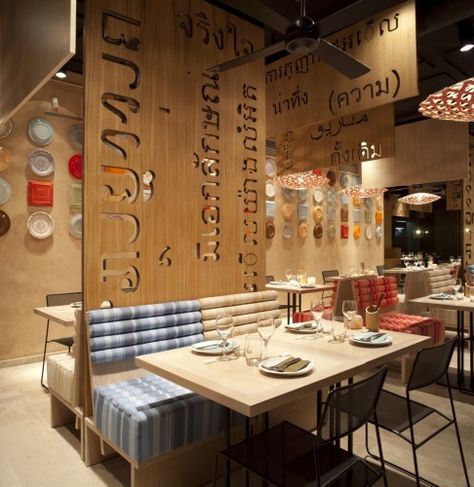 DIY benches from rolled foam and fabric + Cut out wood walls = awesome. Asian Interior Design, Pub Interior, Decoration Restaurant, Modern Architecture Interior, Design Café, Asian Interior, Plafond Design, Asian Restaurants, Modern Restaurant