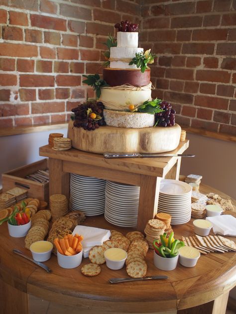 Cheese Table Display, Charcuterie Wedding Cake, Cheese Wheel Cake Wedding, Cheese Stack Wedding Cake, Savoury Wedding Cake, Wedding Cake Made Of Cheese, Cheese Tier Cake, Cake Made Of Cheese Wheels, Pork Pie And Cheese Wedding Cake