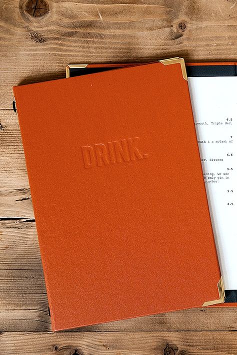 Hardback drinks menu cover design for Pint Shop, a pub & restaurant in Cambridge. Simple execution of debossing but wrapped in a bold orange for standout on the tables. By SAINT Design London #WeDoReallyNiceStuff | #menudesign #restaurantmenu #design #deboss #pubmenu Menu Cover Design Restaurant, Shop Menu Design, Pub Branding, Orange Restaurant, Menu Cover Design, Restaurant Menu Covers, Pub Restaurant, Menu Cover, Restaurant Menu Design