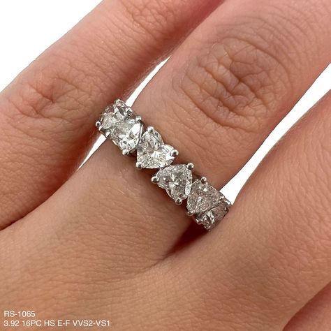 Indulge in eternal love with our exquisite 3.92 Cts Heart Shape Natural Diamond Eternity Band. Featuring high-quality diamonds in a heart shape, this band brings a touch of luxury to any look. Perfect for special occasions or everyday wear, this band will be a timeless addition to your jewelry collection. DIAMOND 3.92 HS TCW 16 PCS E-F VVS2-VS118K WG 3.15 GRAMS SIZE 5.00 RS-1065 Fancy Shape Diamond Ring, Heart Eternity Ring, Heart Diamond Ring, Diamond Heart Ring, Diamond Eternity Band, Heart Diamond, Heart Shaped Diamond, Fancy Diamonds, Heart Wedding