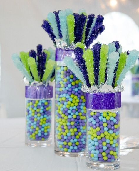 Great rock candy display. Centerpiece or candy buffet. Dewey's candy NYC Rock Candy Centerpiece Ideas, Rock Candy Decor, Rock Candy Centerpiece, Rock Candy Display, Candy Themed Centerpieces, Candy Centerpieces Wedding, Bat Mitzvah Centerpieces, Stick Centerpieces, Candy Giveaway