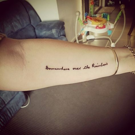 'Somewhere over the Rainbow' in grandmother's handwriting in memory after her passing. Forearm tattoo. Somewhere Over The Rainbow Tattoo Lyrics, Somewhere Over The Rainbow Tattoo Ideas, Grandmother Remembrance Tattoos, Grandmother Tattoo Ideas Memories, Over The Rainbow Tattoo, Somewhere Over The Rainbow Tattoo, Memorable Tattoos, Wizard Of Oz Tattoo, Grandmother Tattoo