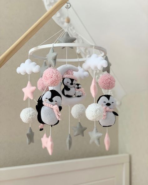 Hanging penguins baby mobile for the newborn.Penguin baby mobile is ideal for decorating your contemporary neutral baby nursery and the best present for your new child or for a baby shower. Mobile inclouds five differents penguins, three clouds, seven little stars and seven big stars, six pompons and other. The size. The diameter of the ring is 22 cm. Full length ~ 40-45 cm. Materials Ring, Hypoallergenic felt Hypoallergenic holofiber filler. Care. Dry or steam cleaning. Our mobiles are for deco Winter Themed Nursery, Penguin Nursery Ideas, Penguin Baby Shower Ideas, Penguin Nursery Theme, Penguin Nursery, Neutral Baby Nursery, Nursery Themes Neutral, Penguin Baby Showers, Stars Baby Mobile