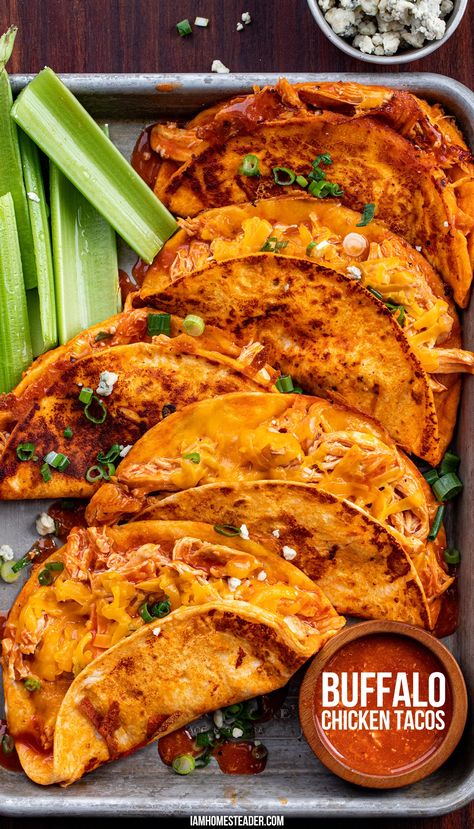 A silver serving tray filled with buffalo chicken tacos, celery sticks, and extra buffalo sauce for dipping. Healthy Buffalo Chicken Tacos, Things To Make With Buffalo Sauce, Buffalo Tacos Chicken, Buffalo Chicken Dip Tacos, Buffalo Chicken Tacos Crockpot, Football Chicken Recipes, Buffalo Chicken Breast Recipes, Recipes With Buffalo Sauce, Crispy Buffalo Chicken Tacos