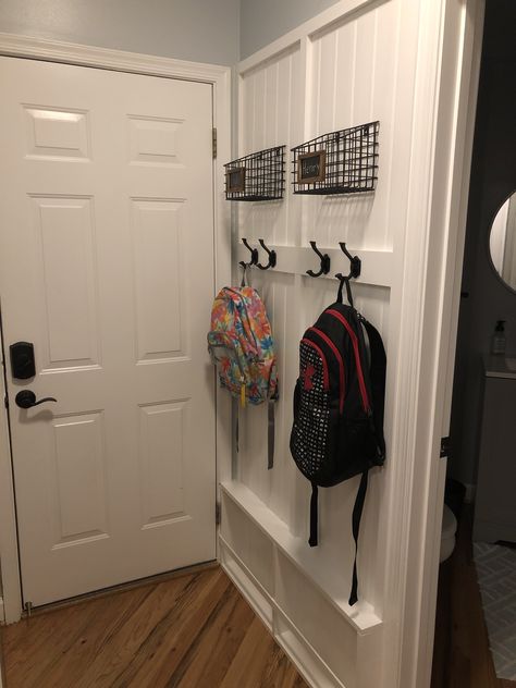 Storing Backpacks At Home, Backpack Area For Kids, Small Garage Entryway, Entryway Backpack Organization, Built In Backpack Storage, Backpack Holder Ideas, Backpack Wall Organization, Backpack Hooks Entryway, Backpack Hanging Ideas