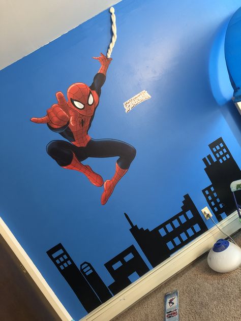 For people who live in apartments and can’t paint walls, Walmart sales wall decal material. All the building were created by hand from that material Spiderman Accent Wall, Spiderman Bedroom Ideas Kid Rooms, Spiderman Wall Painting, Spiderman Themed Bedroom, Spiderman Kids Room, Aesthetic Posters For Bedroom, Design A Superhero, Spiderman Room Decor, Spiderman Bedroom