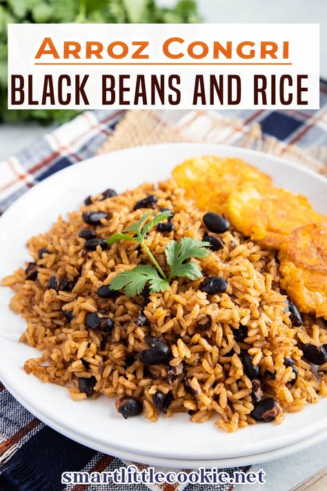 This Black Beans and Rice or Arroz Congri is a popular Latin Caribbean dish filled with Latin flavors like garlic, oregano, and cilantro. Black Beans and Rice or Arroz Congri is a traditional rice dish popular in Cuba and the Dominican Republic. Like most Latin Caribbean dishes, there are a lot of similarities and also slight differences in preparation from country to country. | Smart Little Cookie @smartlilcookie #blackbeansandrice #latinrecipes #dominicanrecipes #smartlittlecookie Easy Black Beans, Black Beans And Rice Recipe, Slow Cooker Pork Roast, Bbq Side Dishes Recipes, Black Beans And Rice, Dominican Food, Roasted Brussel, Beans And Rice, Rice Dish