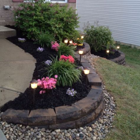 fine 49 Outdoor Garden Decor Landscaping Flower Beds Ideas https://matchness.com/2017/12/31/49-outdoor-garden-decor-landscaping-flower-beds-ideas/ Flower Bed On Sloped Yard, Corner Curb Appeal Yard Landscaping, Dark Mulch Landscaping Flower Beds, Front Yard Land Scaping Ideas, Flowerbeds Ideas Easy, Dark Mulch Landscaping, Flower Bed Lighting, Retaining Wall Garden, Taman Air