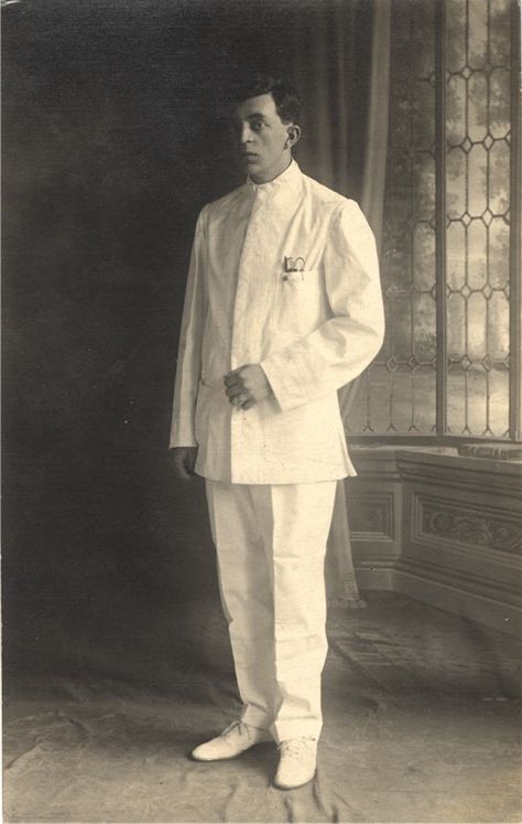 A male nurse in his nursing uniform stands for a portrait, United States, ca. 1910. Pictures of Nursing: The Zwerdling Postcard Collection. National Library of Medicine Medicine Clothes, Victorian Doctor, Nursing Student Humor, Radiology Humor, Pith Helmet, Retail Robin, White Uniform, Doctor Outfit, Nurse Aesthetic