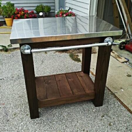 Grill table with stainless steel top | DIY - love the pipe handle! Outdoor Work Table Diy, Industrial Side Table Diy, Outdoor Butcher Block Table, Outdoor Grill Tables, Outdoor Grill Table Diy, Diy Outdoor Food Prep Table, Grilling Table Outdoor, Outdoor Cooking Table Diy, Outdoor Prep Table Diy