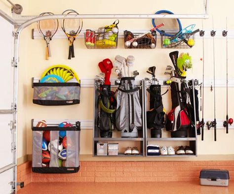 The garage can become a cluttered mess very quickly. Use the walls for storage. #organizing #garage Golf Storage, Backyard Golf, Sports Display, Sports Equipment Storage, Casa Garage, Garage Solutions, Sports Storage, Ultimate Garage, Garage Storage Solutions