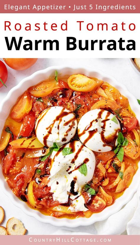 Easy baked burrata recipe combines gooey cheese with mouthwatering oven roasted tomatoes. Warm burrata is an effortless appetizer. Serve homemade baked burrata cheese as a starter for an elegant dinner or any time you need an impressive and easy appetizer. It makes a great party app served with crostini, toast, crusty bread, breadsticks, crackers, or vegetable sticks. You can make variations with pesto or balsamic vinegar reduction or turn the dish into bruschetta. | CountryHillCottage.com Baked Burrata Recipe, Easy Burrata Recipe, Baked Burrata Appetizer, Baked Burrata, Burrata Appetizer, Roasted Heirloom Tomatoes, Tomato Appetizers, Burrata Recipe, Baked Appetizers